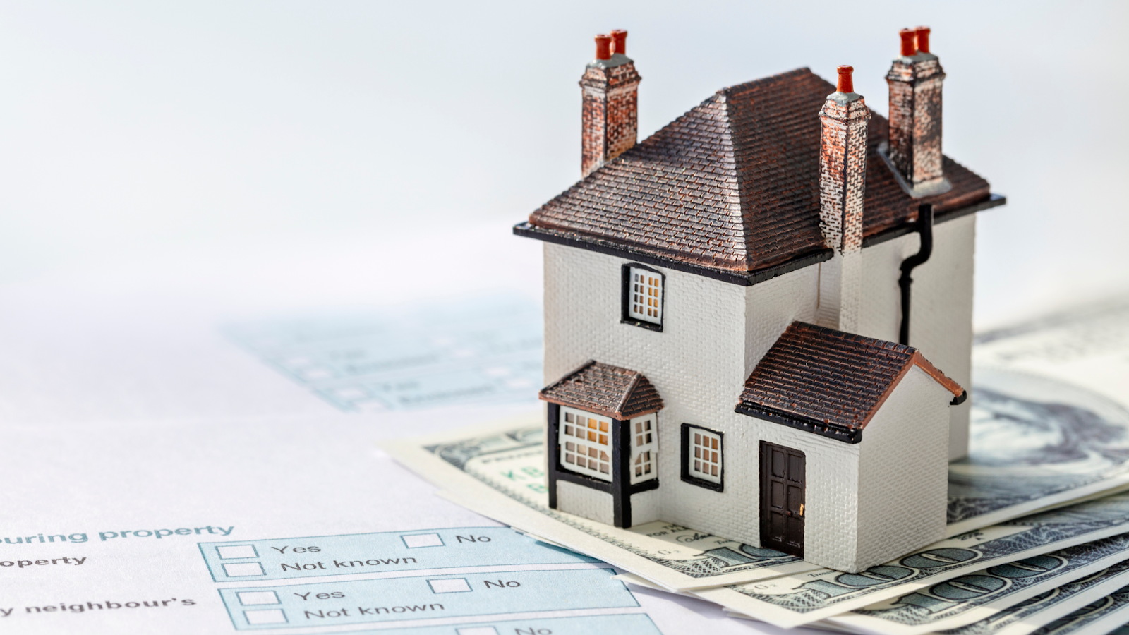 House on money, mortgage or property real estate tax