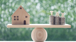 House and coins symbolizing home equity and taxation