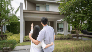 Texas residents couple looking at their home